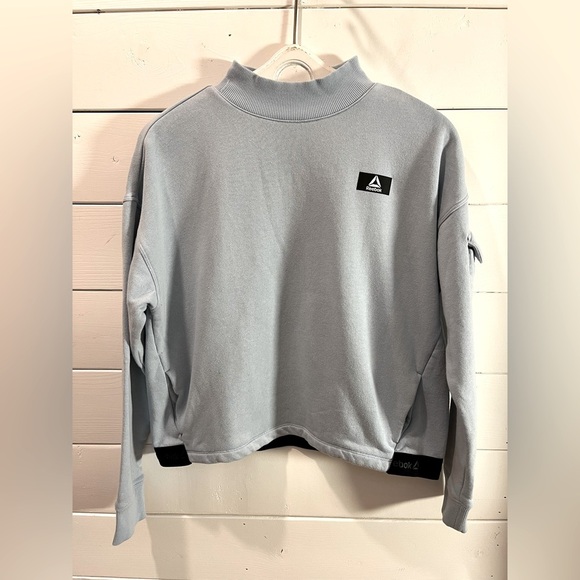 🩵 REEBOK – Light blue mock-neck sweatshirt – Size L - Picture 1 of 9